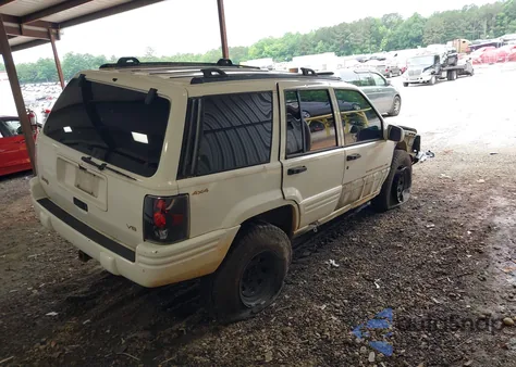 1997 Jeep Grand Cherokee Limited из США, поврежденный, VIN 1J4GZ78YXVC674390